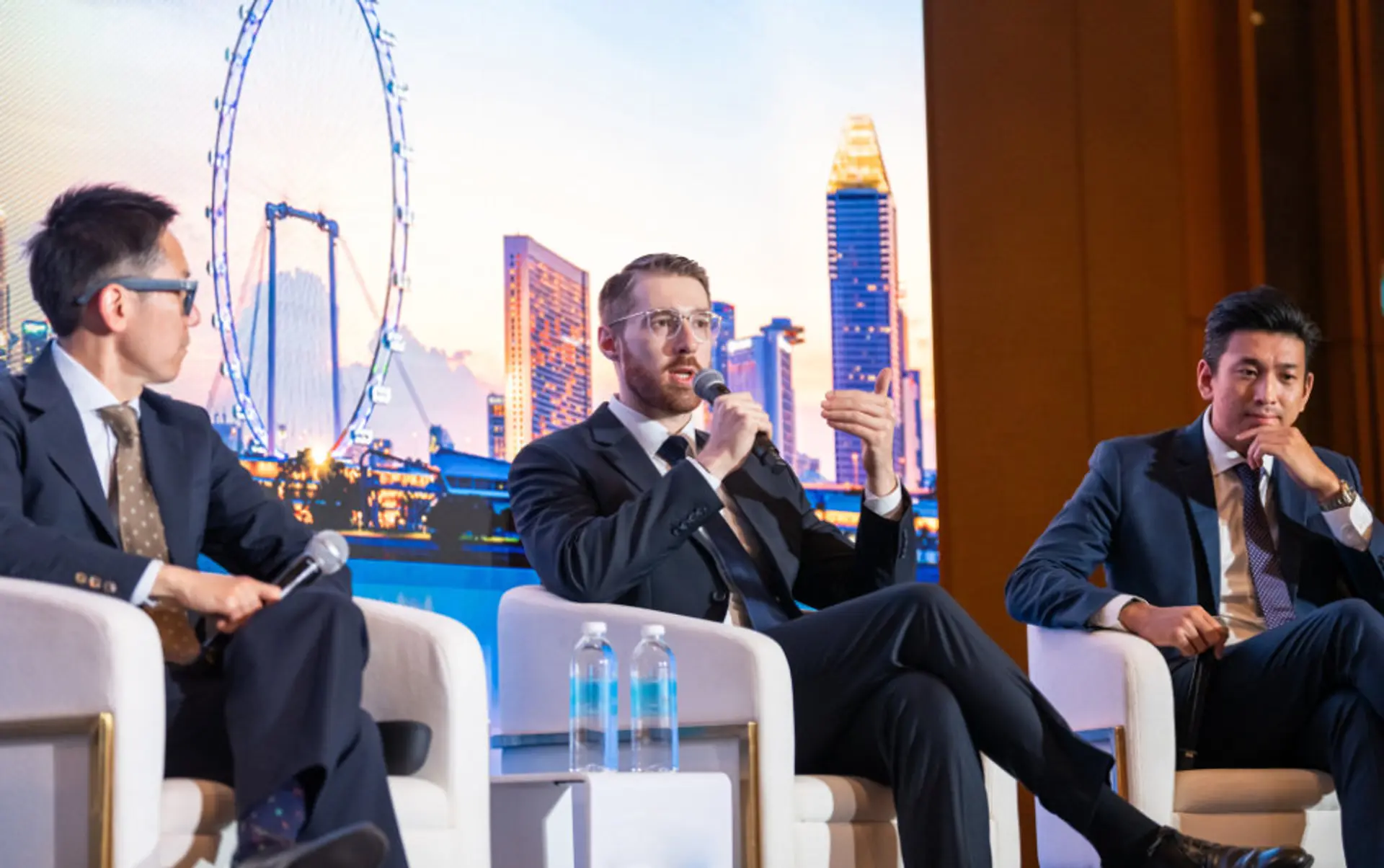Michael Brenndoerfer speaking on a panel at Endowus Singapore